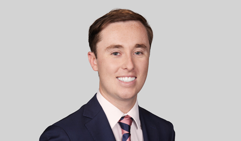 Portrait photo of a man in a suit